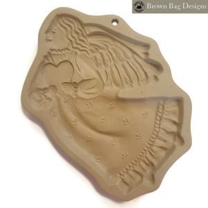 Brown bag cookie art vintage 1986 clay cookie mold flying angel with heart.